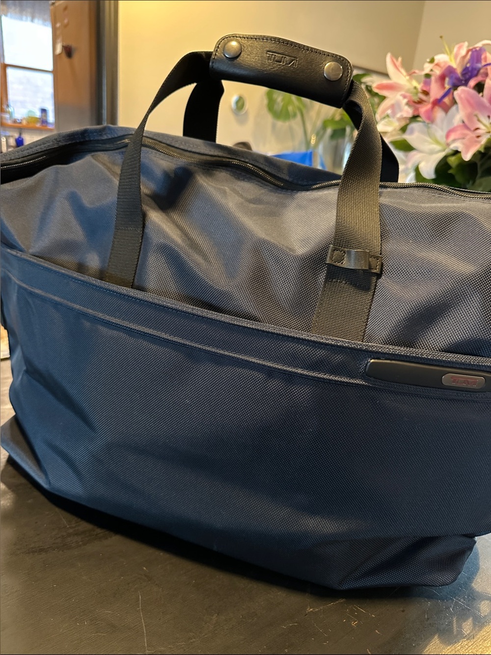 Tumi Navy Duffel Bag with Black Straps